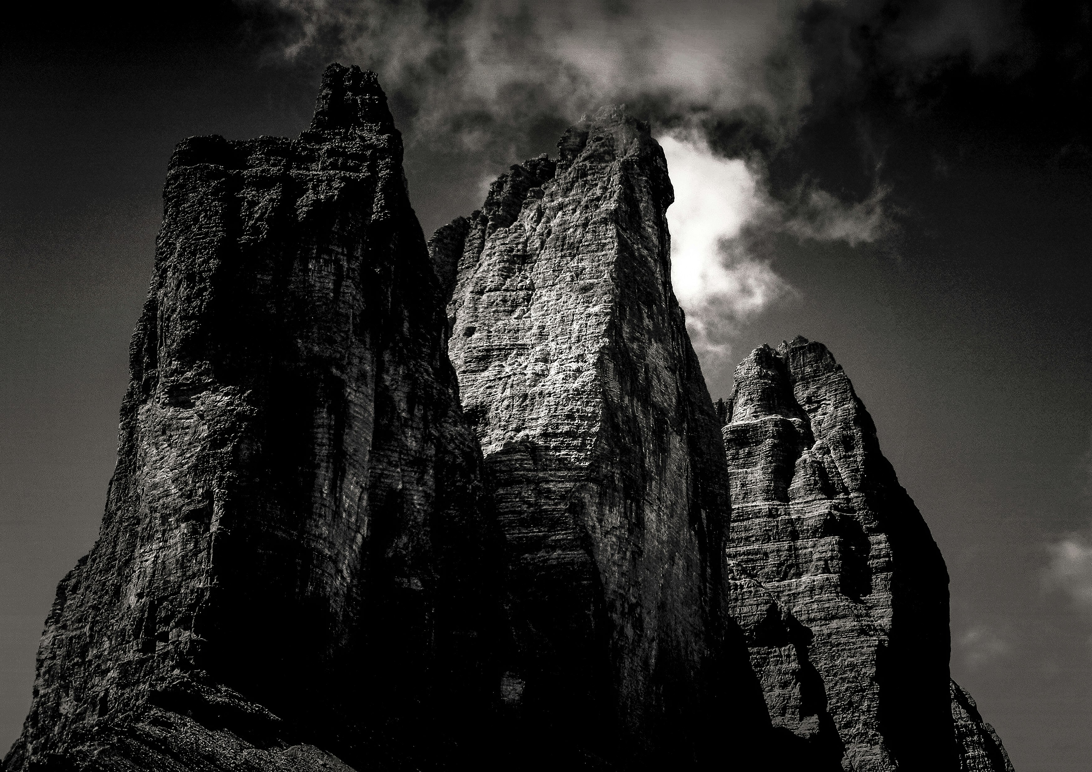 grayscale photo of rock formation